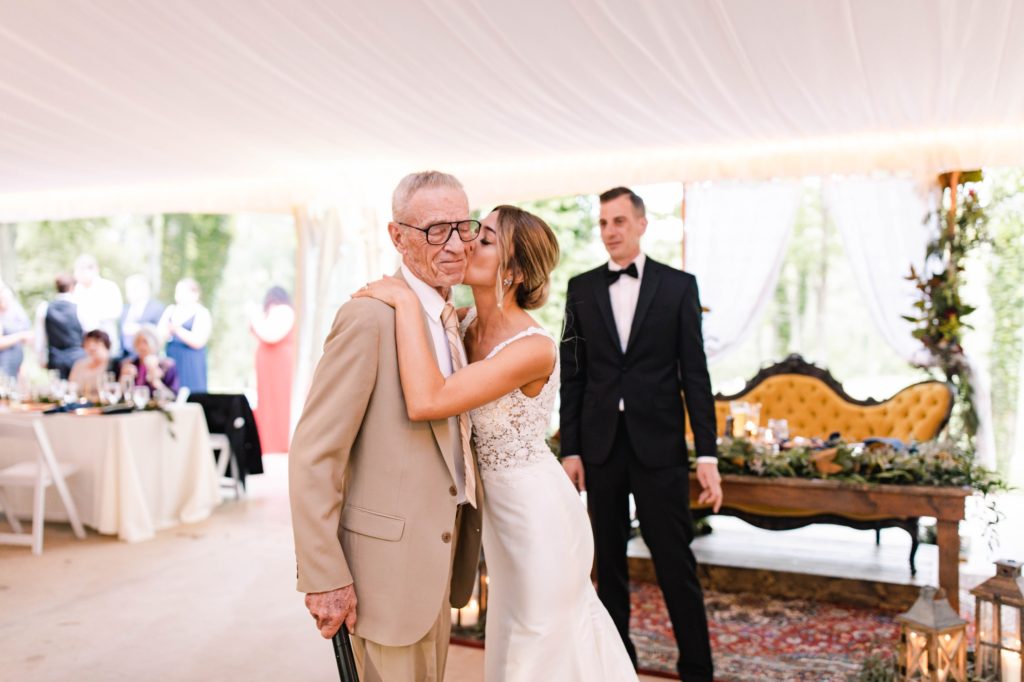bride kisses grandfather