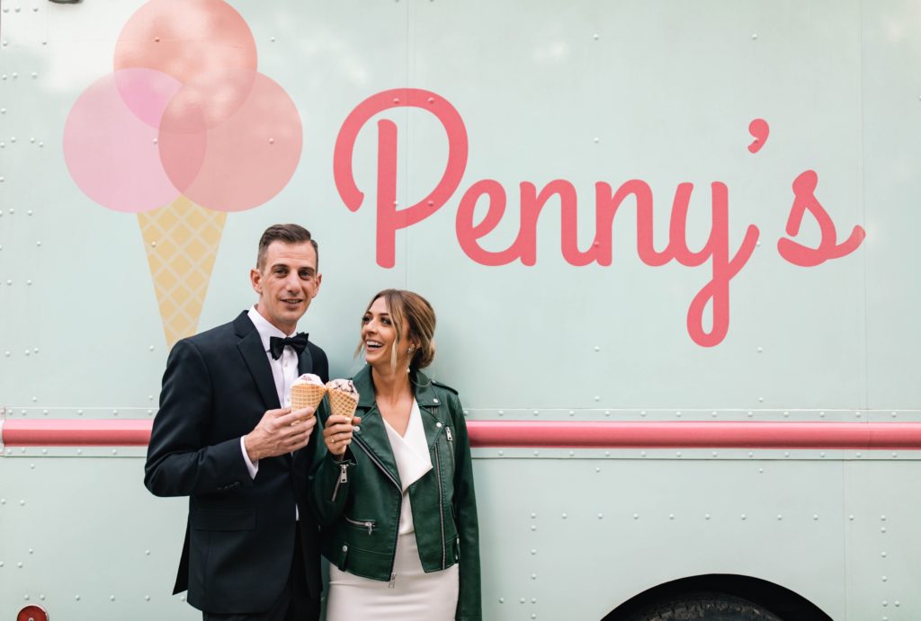 bride and groom eating ice cream for photos