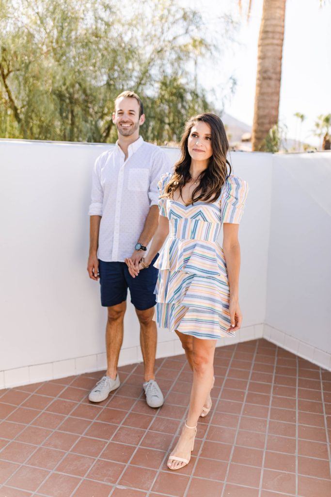 couple standing on rooftop deck in palm springs