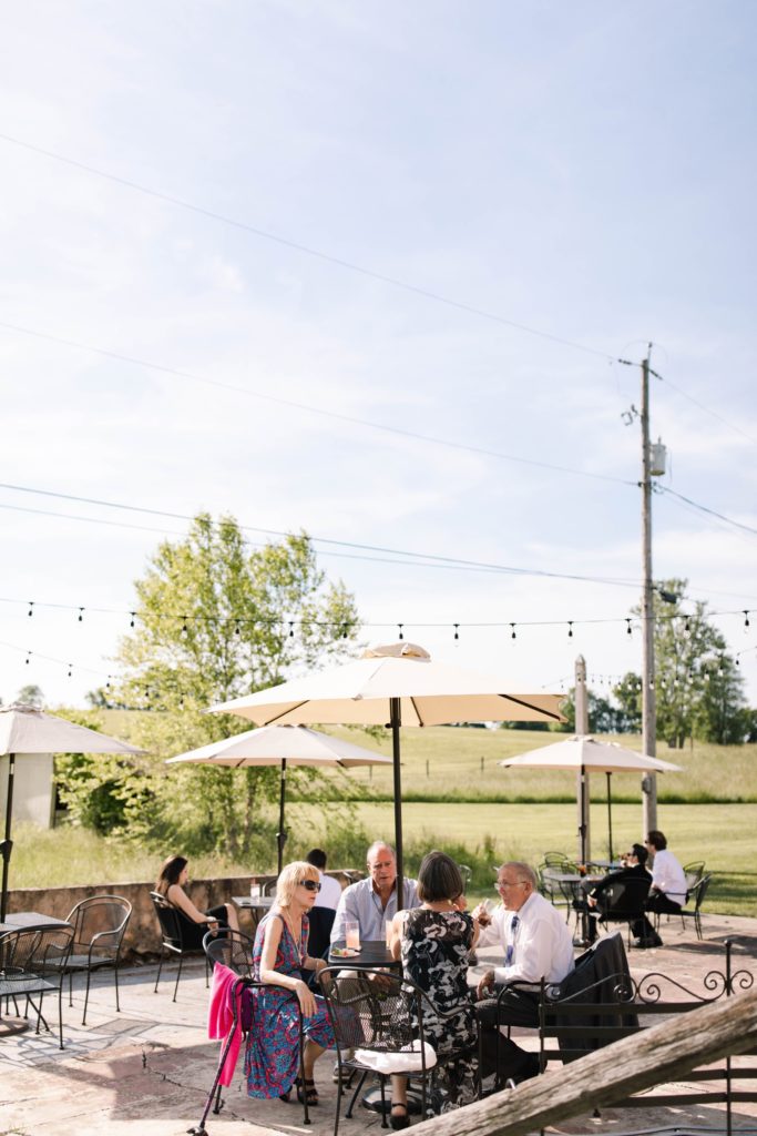 outdoor cocktail hour at barn wedding