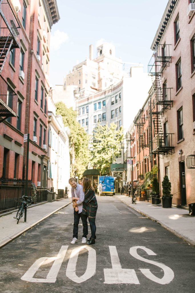 couple standing in nyc alley