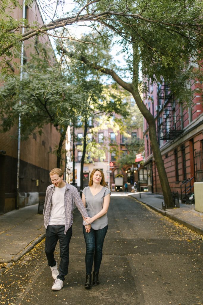 couple walking in nyc alley