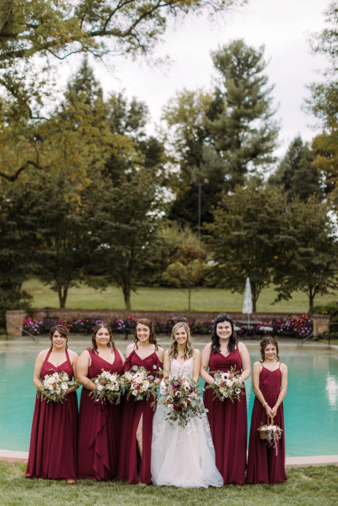 bridesmaids by pool