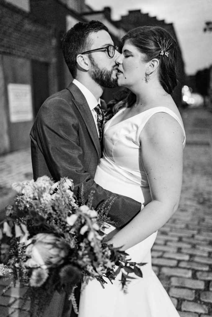 bride and groom kiss in philadelphia