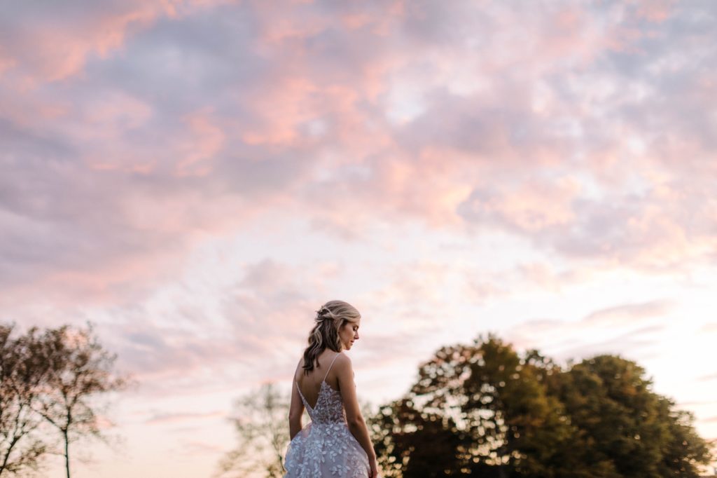 bride in beautiful sunset 