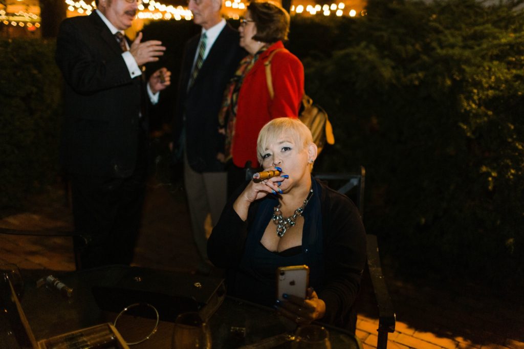 guests smokes cigar