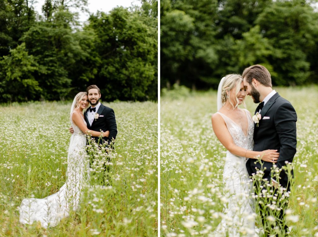 couple poses for wedding pictures in flower field