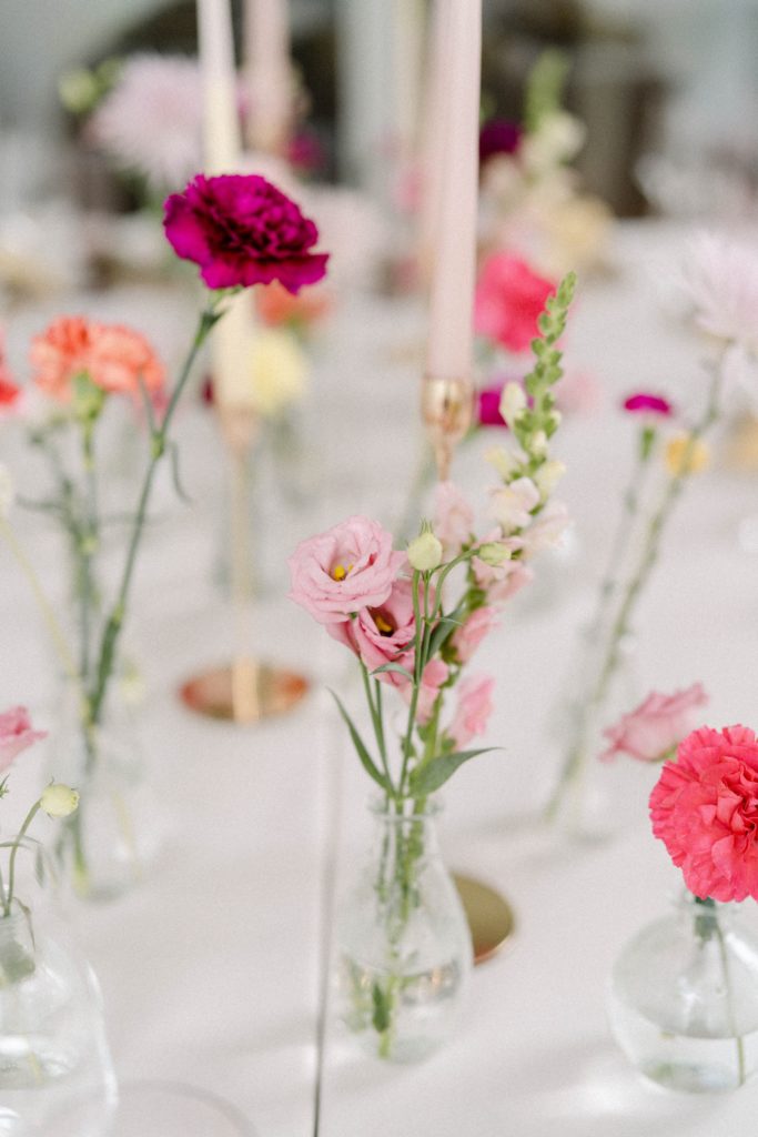 bright flowers on table at intimate wedding