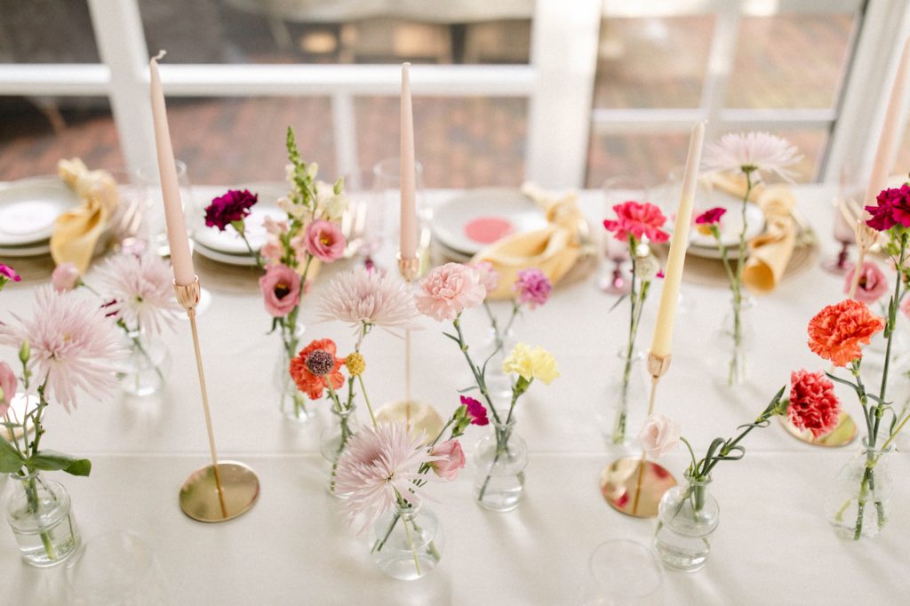 flowers on table at backyard wedding