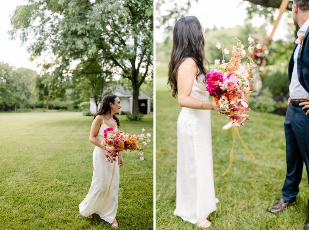 bride walking holding bouquet at intimate wedding