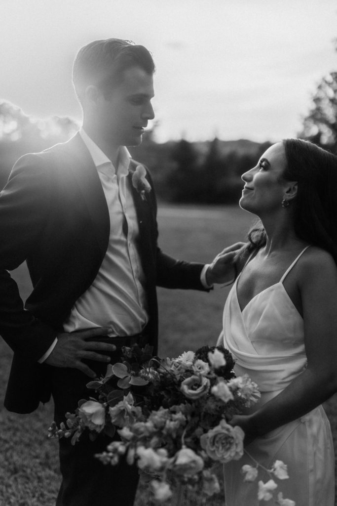 black and white photo of couple at intimate wedding
