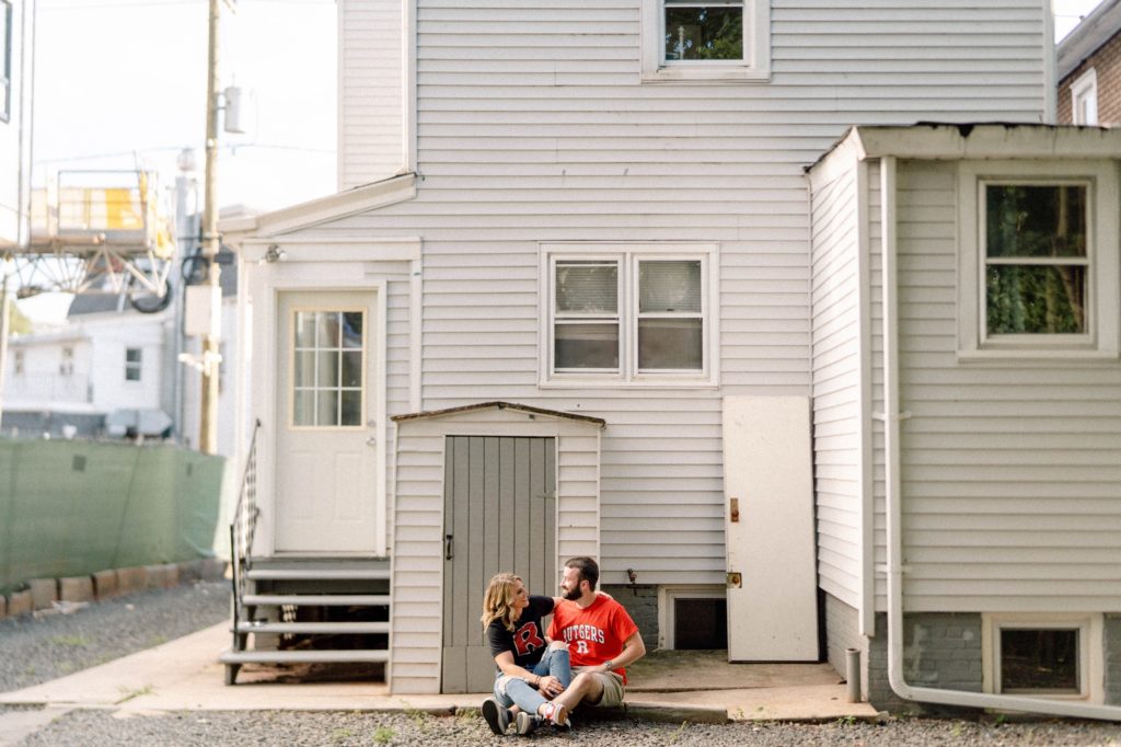 couple sitting on dorm in rutges
