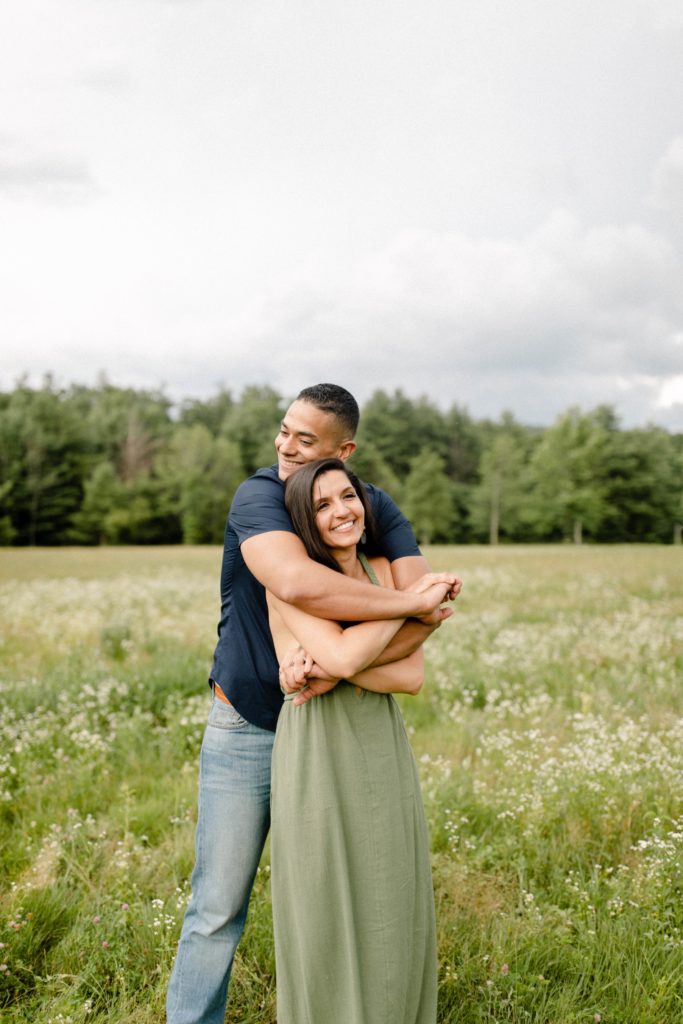 couple posing for engagement session in woodstock