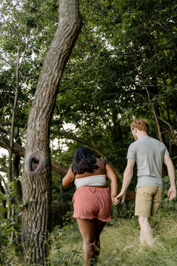 couple walking in weiser forest