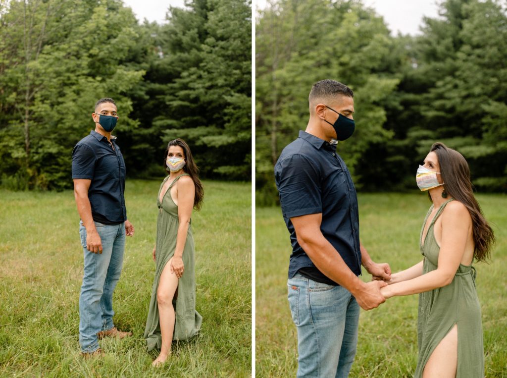 couple posing with masks for engagement session