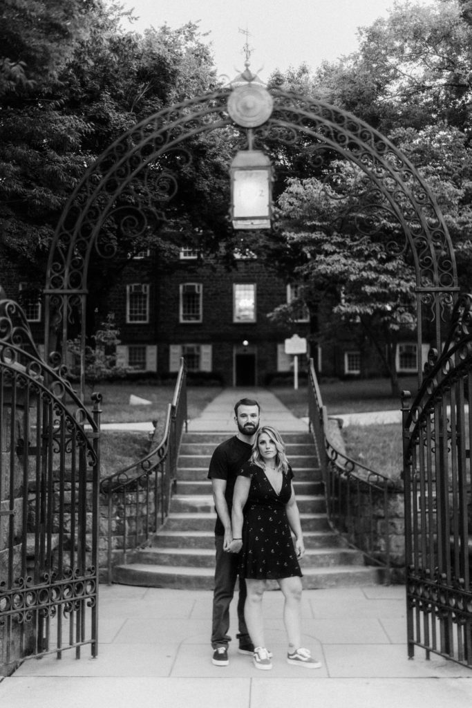 couple poses for engagement session in rutgers