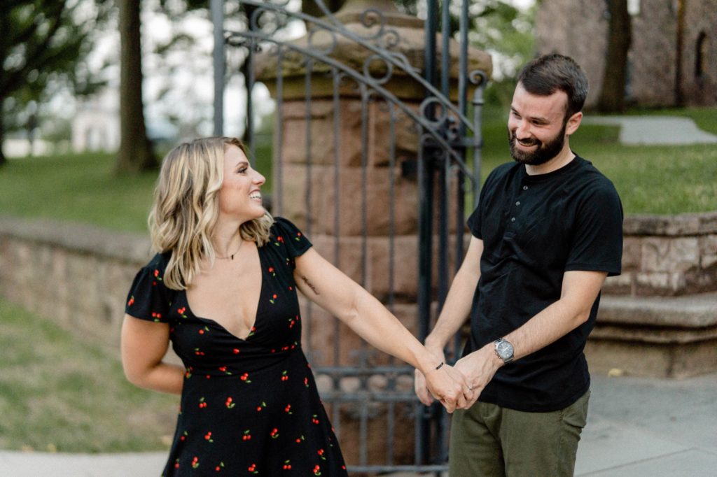 couple posing for rutgers engagement session