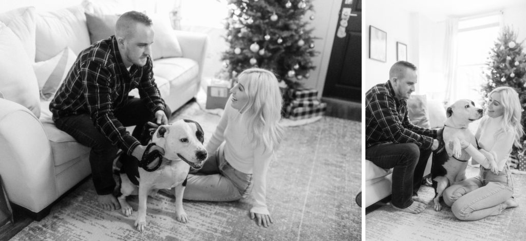 a couple loving their dog during in home engagement session