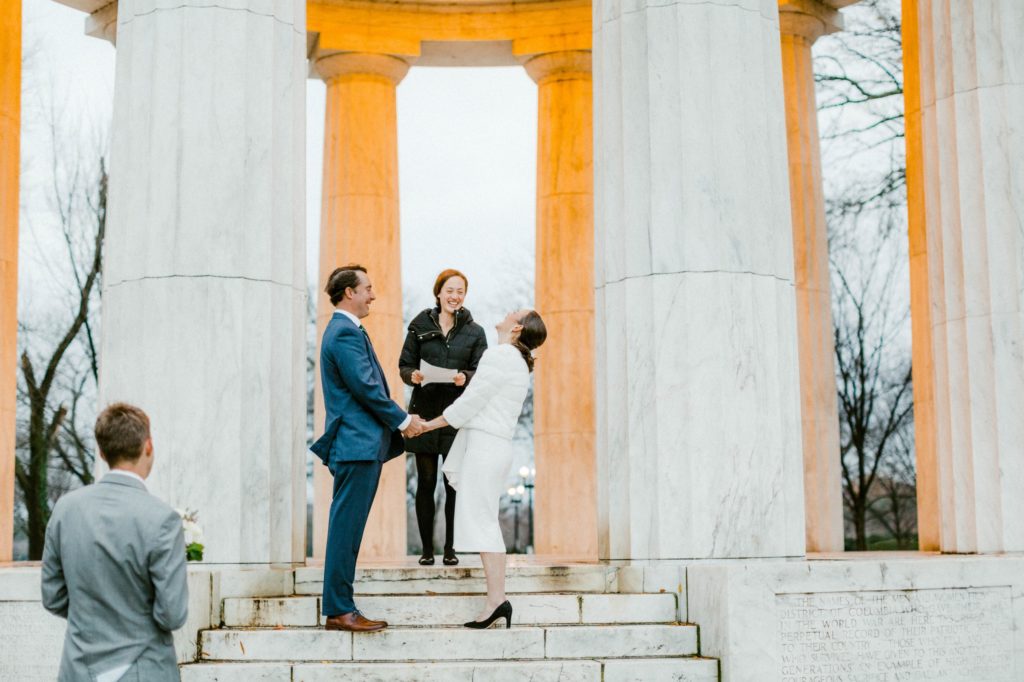 couple eloping on steps of dc war memorial