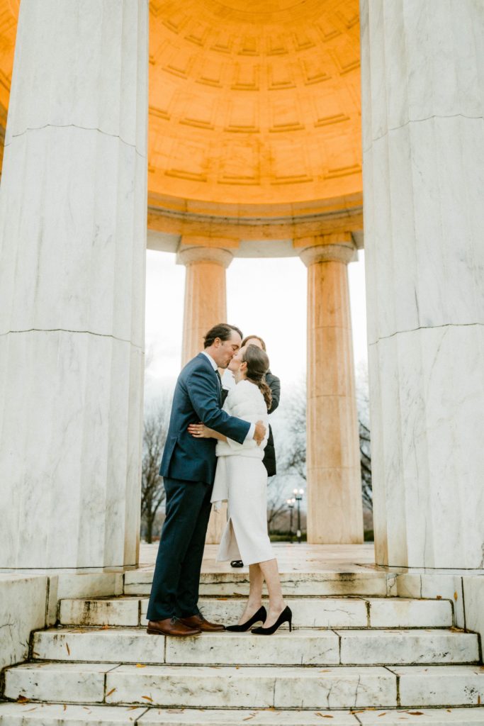 couple eloping on steps of dc war memorial