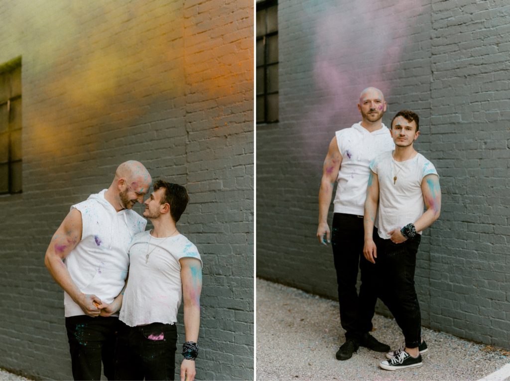 a couple posing under smoke bombs