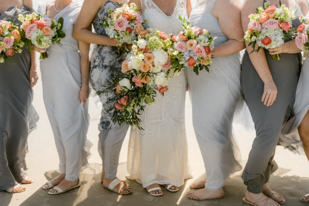 bride and bridesmaids flowers at hilton head beach wedding