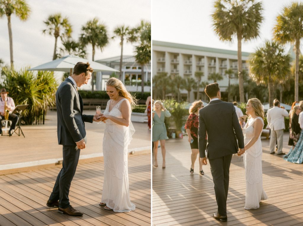 bride and groom walk through cocktail hour at hilton head beach wedding