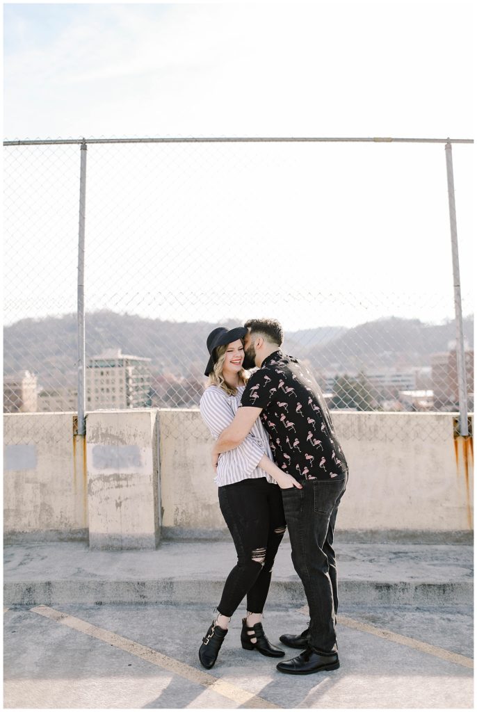 an engagement session in asheville on parking garage