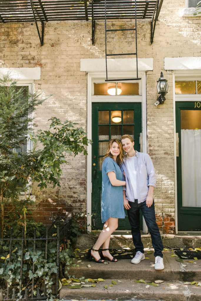 couple standing on porch in new york city
