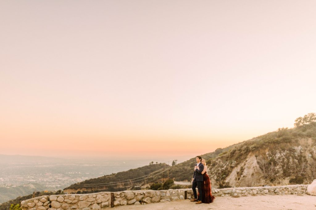 a couple posing for engagement session in los angeles 