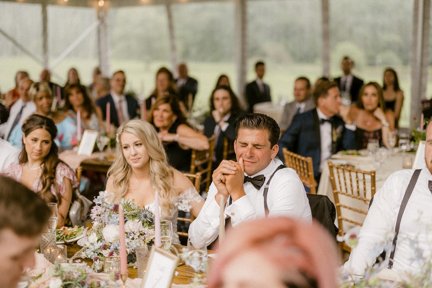 groom crying during wedding reception speeches