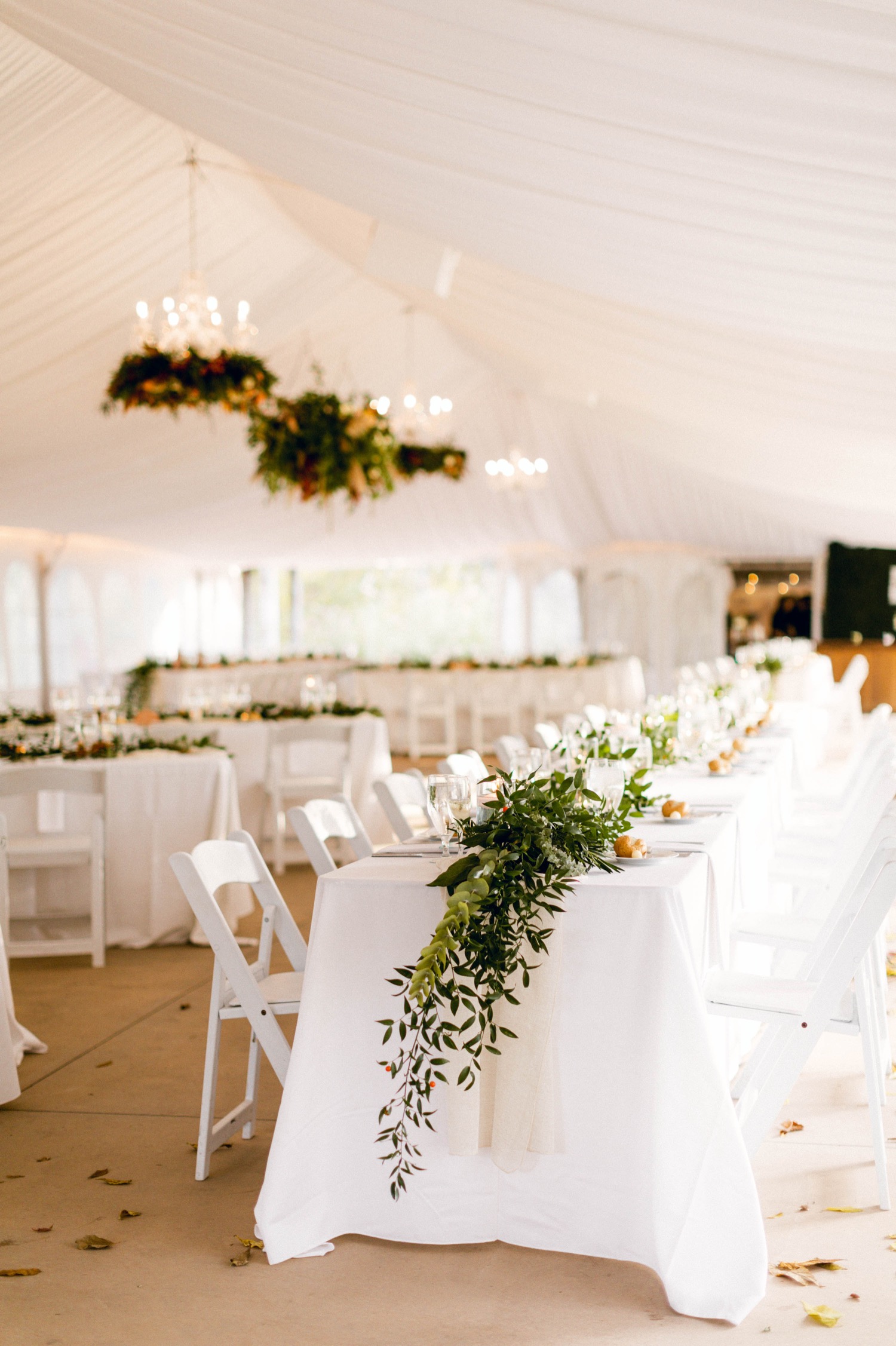white tent wedding reception table settings