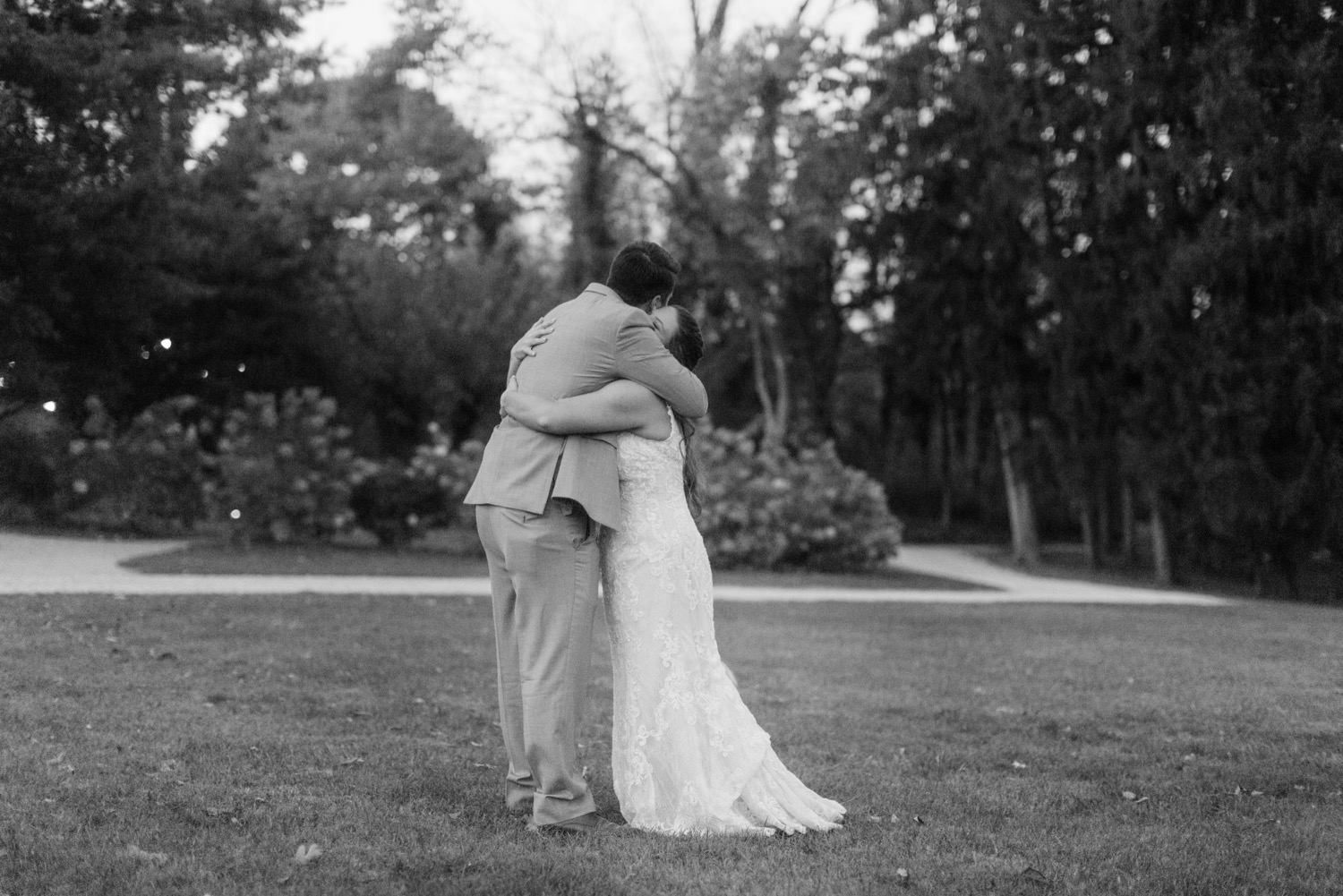 bride hug outdoor wedding