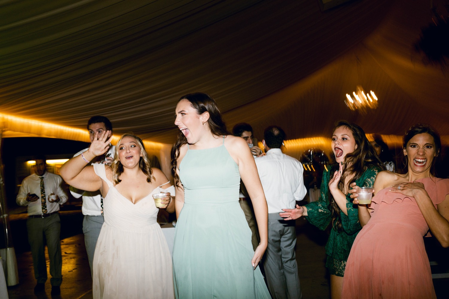 group dancing together at wedding reception