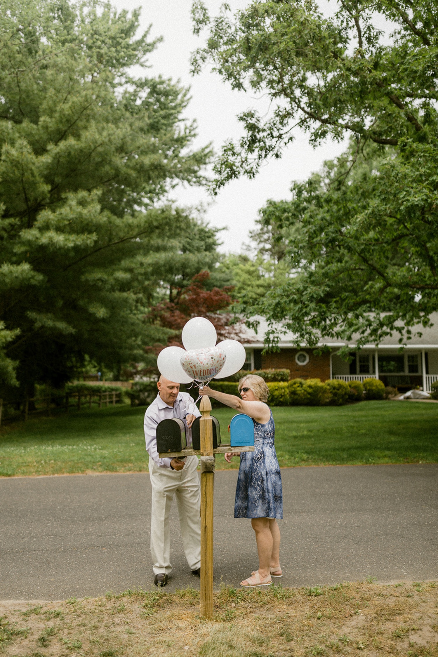 hanging balloons on mailbox backyard micro wedding
