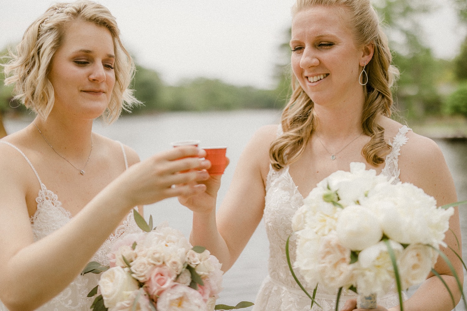 brides cheers shot glasses lakeside micro wedding