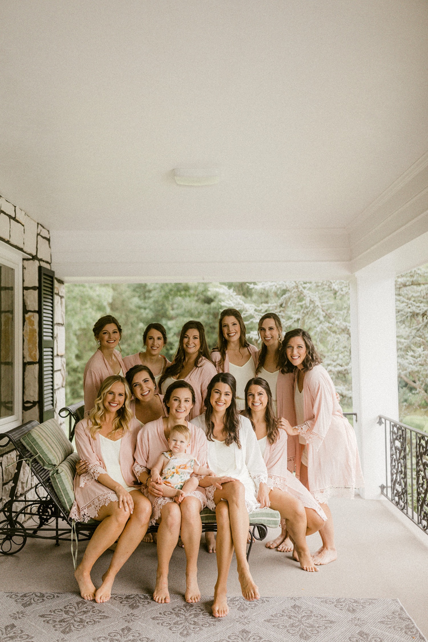bride and bridesmaids pink robes