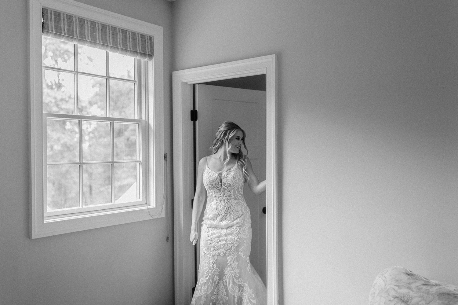 black and white bride walking out of room