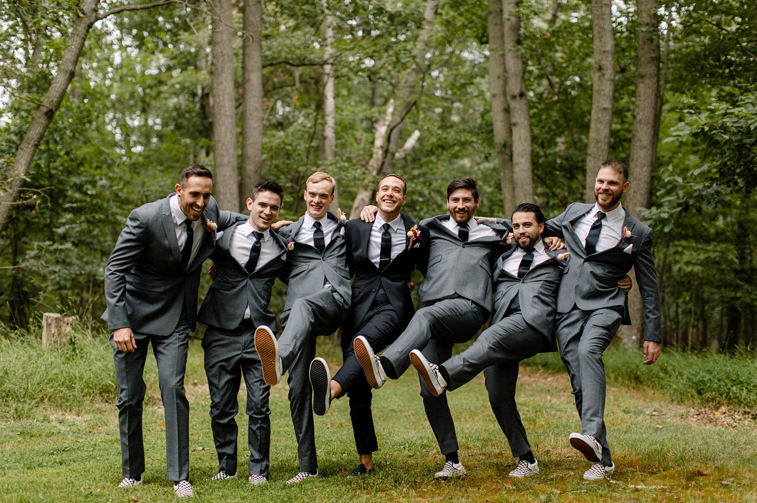 groomsmen kicking dancing photo