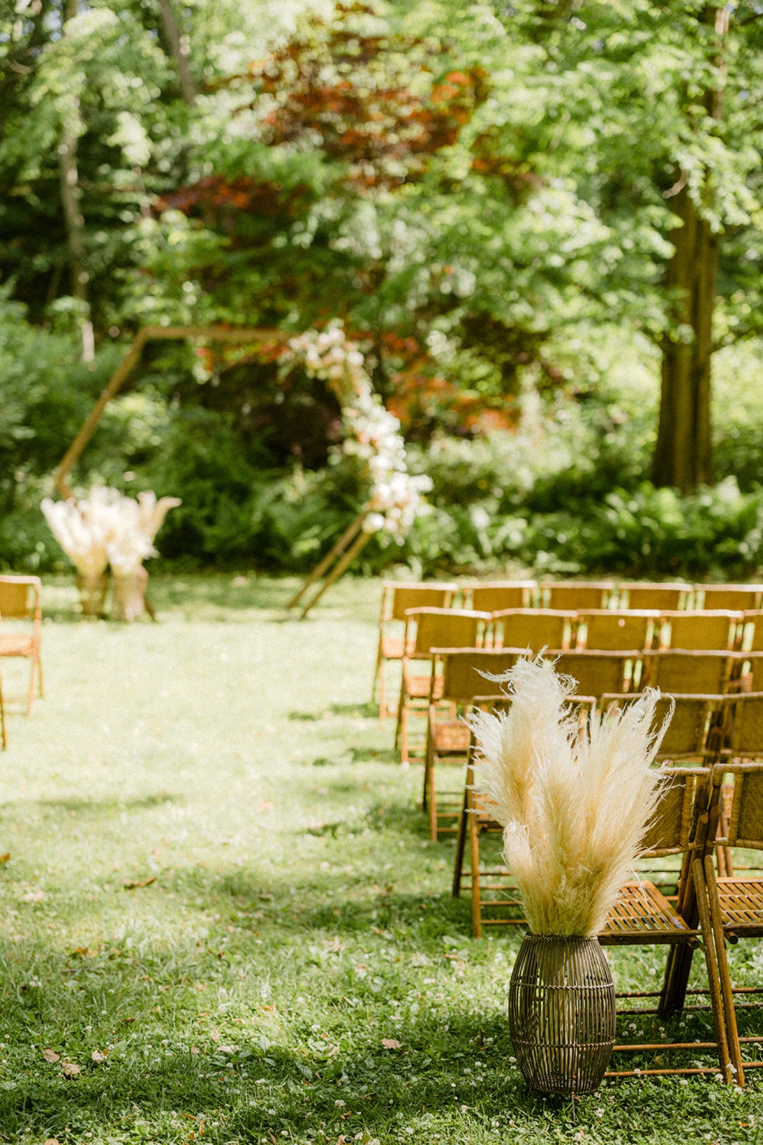 wicker bamboo chairs and pampas grass neutral outdoor wedding the old mill philadelphia