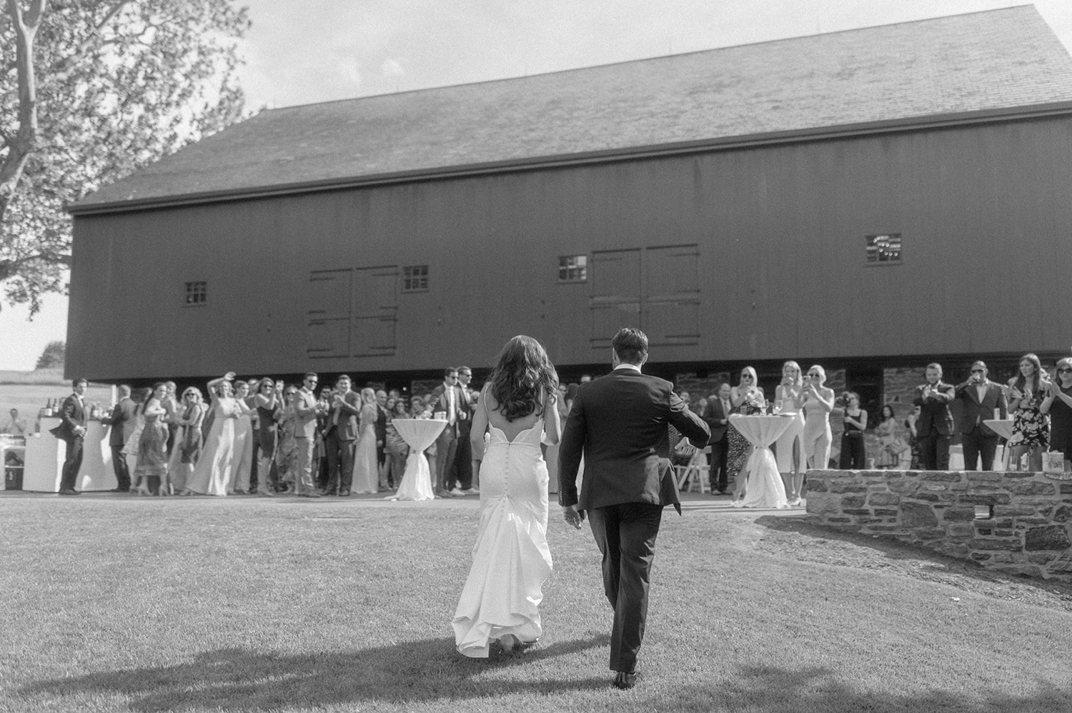 bride and groom arriving at cocktail hour Farm at Eagles Ridge