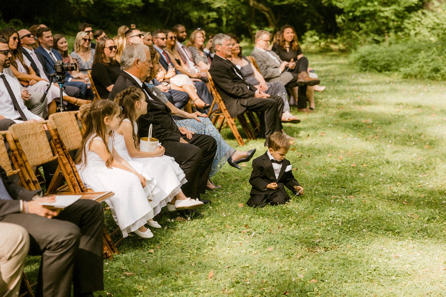 ring bearer and flower girls guests during wedding ceremony