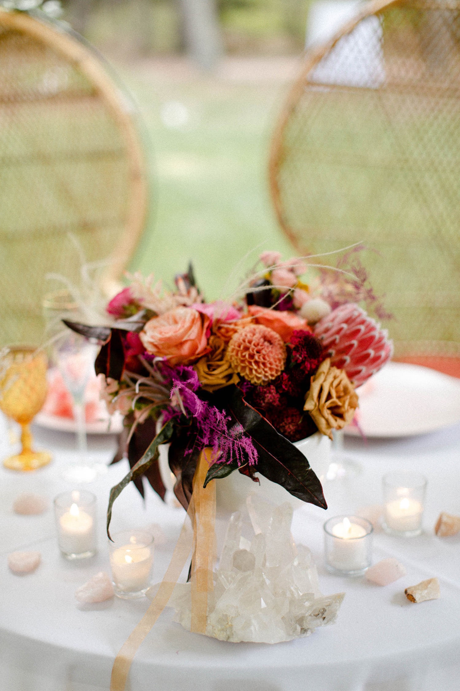 jewel tone flower centerpieces colorful bohemian wedding