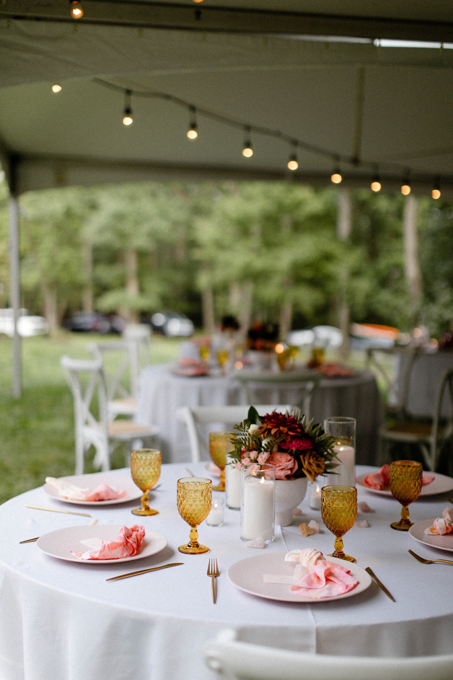 reception table setting colorful bohemian backyard micro wedding