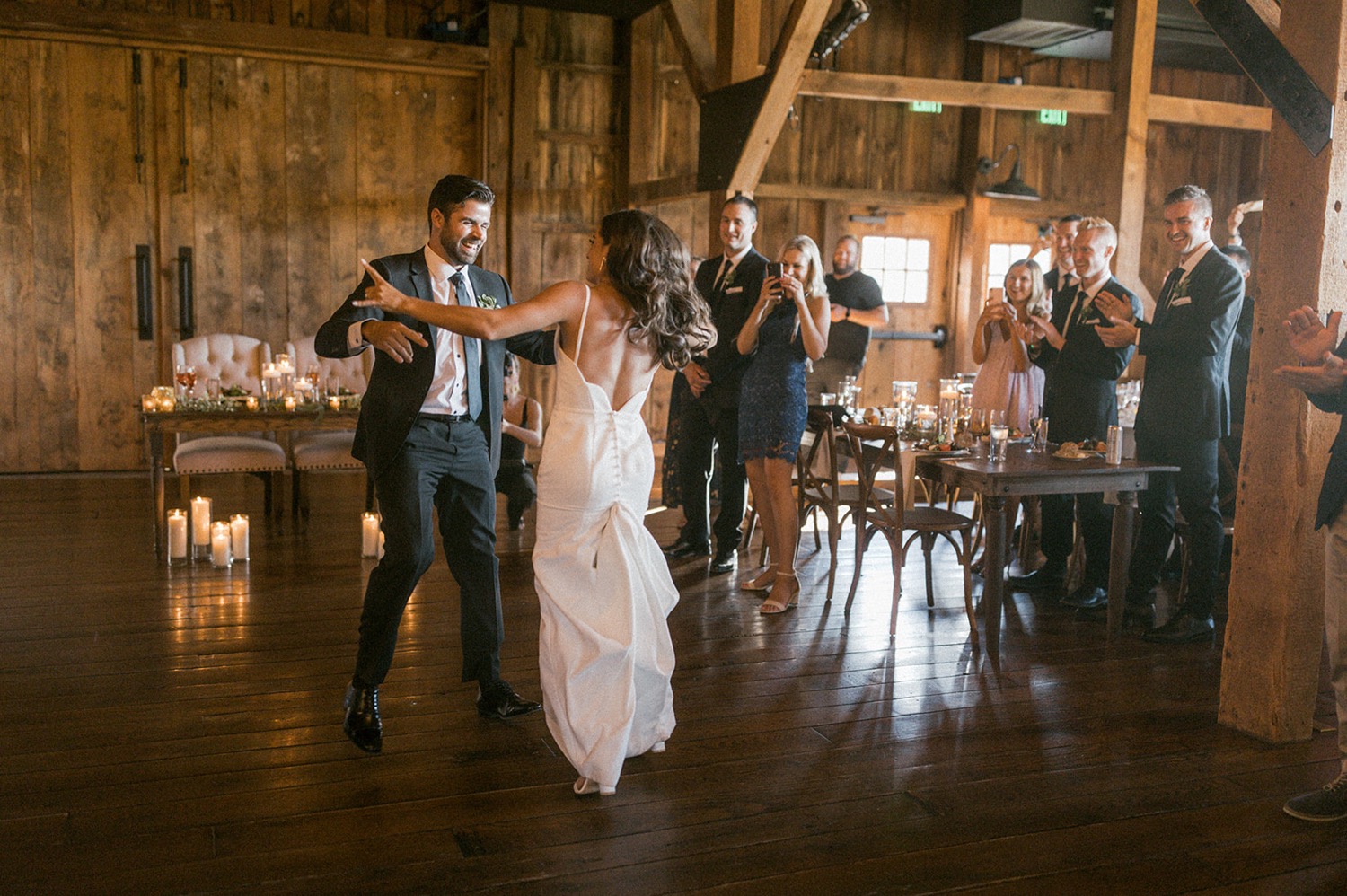 bride and groom dancing rustic barn wedding reception