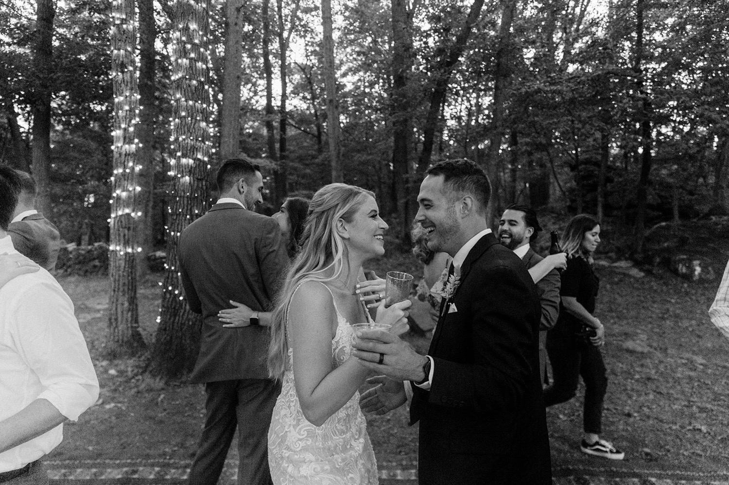 bride and groom slow dancing in forest bohemian backyard wedding