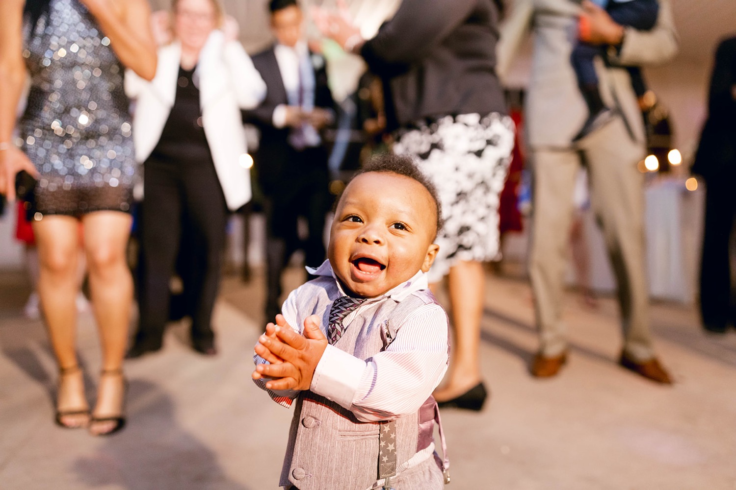 baby clapping dancing wedding reception