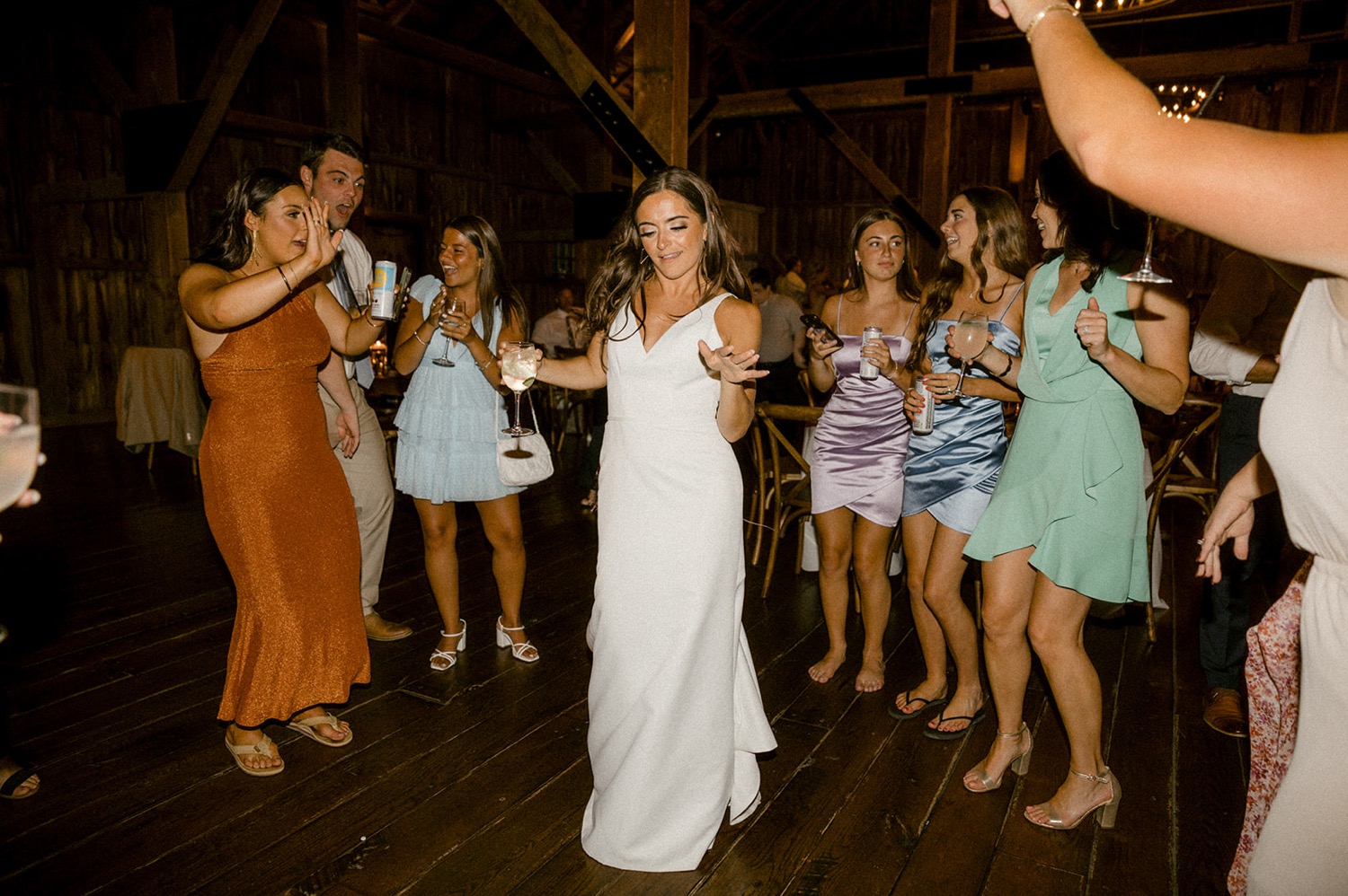 bride dancing during wedding reception rustic barn