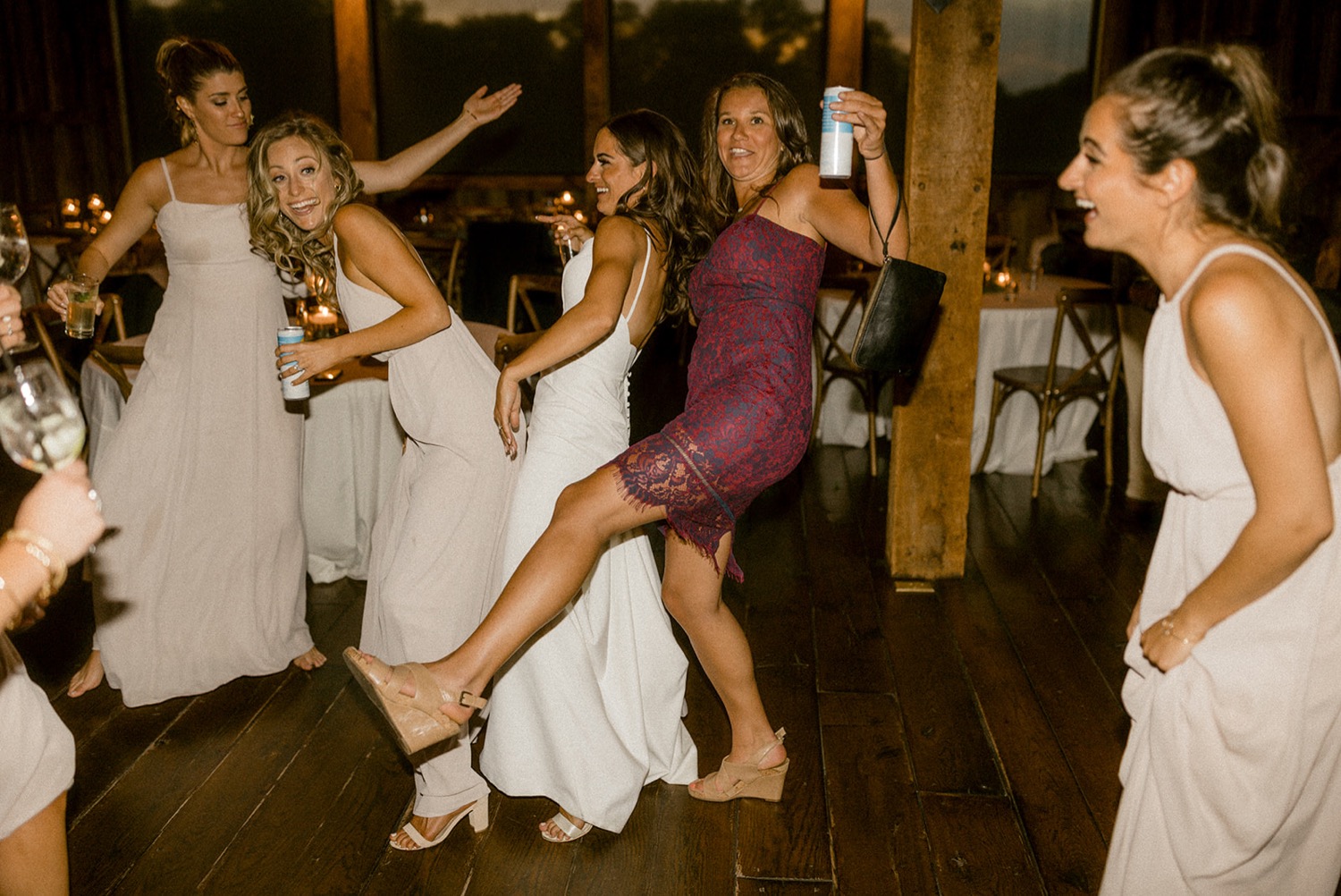 bride dancing with friends wedding reception