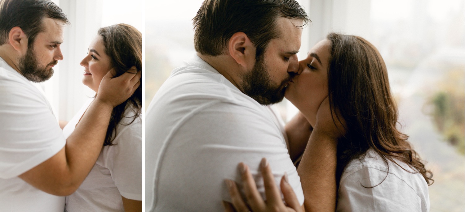 couple kissing engagement session casual
